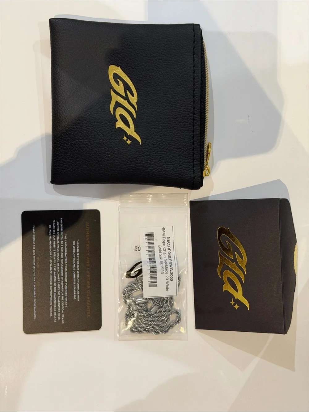 Gld Men’s Black Zip Pouch with Gold Logo